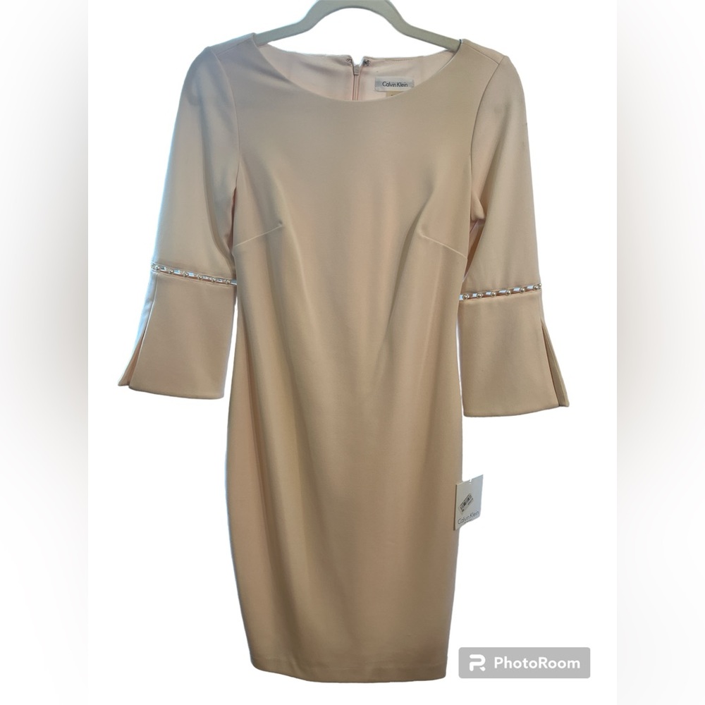 Calvin Klein dress. Light pink with tag.